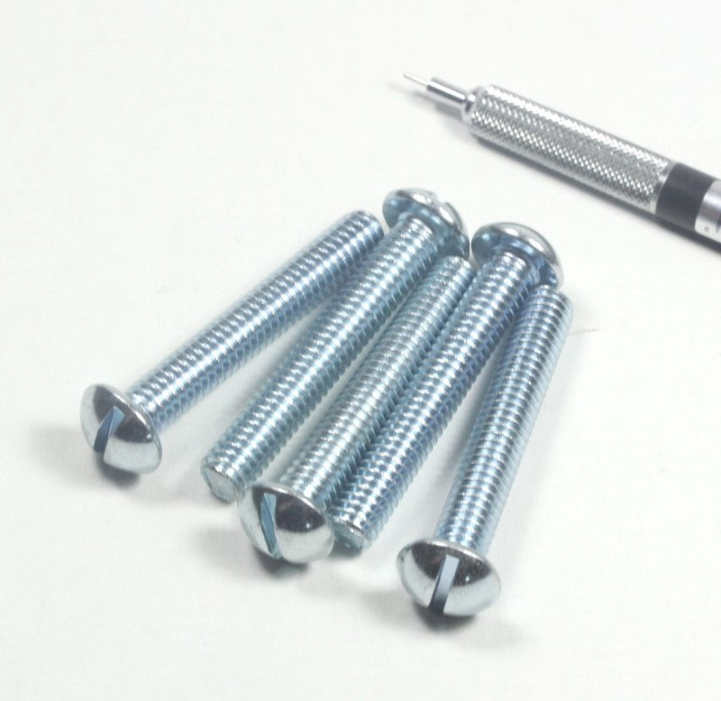 5 5/16" x 2" screws shown with mechanical pencil for scale.