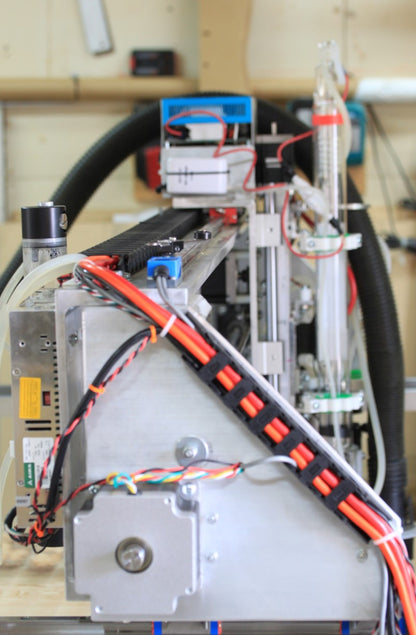 Fabricator Pro CNC Router view of the gantry motor side with the Z-axis with the CO2 laser attached.