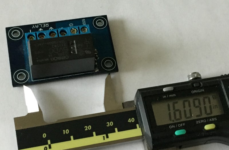 Measurement of wide spaced mounting holes of 5V 250V 12A relay board