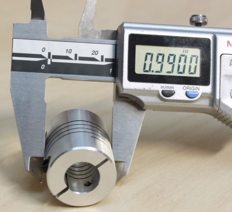 Caliper measurement of the outside diameter at 1 inch of the 1/4" to 1/2" (12.7mm to 6.35mm) one piece flexible clamping coupling