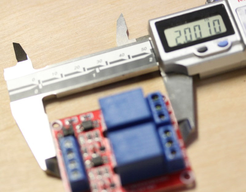 Long dimension of the 24VDC dual relay module at 2 inches