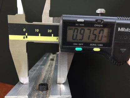 Image of the measurement from inside dimension of mounting holes widthwise at .975 inches