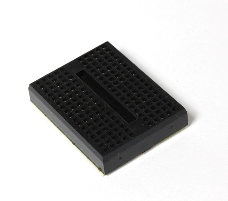 A single mini breadboard 17X10. Black color. 