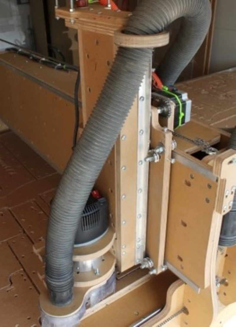 Vacuum hose shown inserted into the top of the z-axis for stability down to the dust shoe