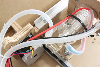 Install the silicone tube to the outlet