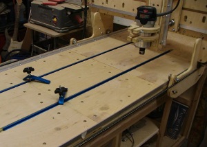 the table bed of the blackToe CNC Machine with two t-slots along the length of the table.