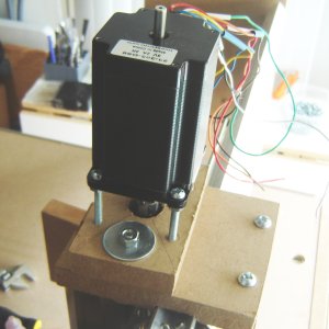 The Z axis motor mounted to the top of the z-axis assembly.